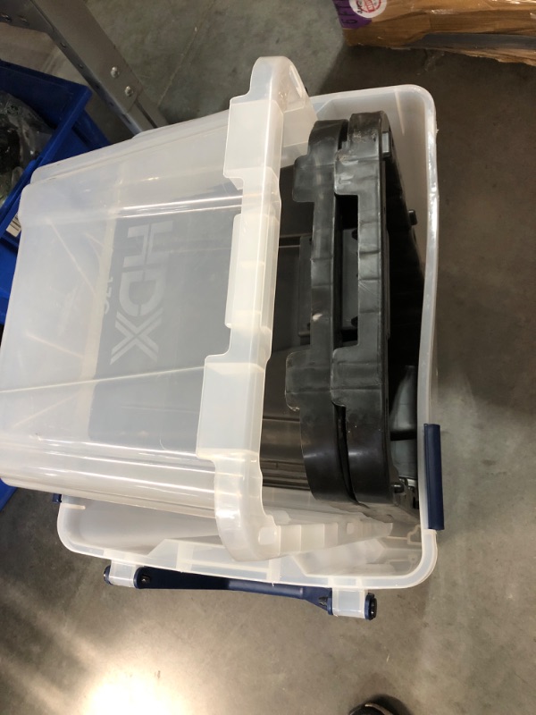Photo 1 of **NON-REFUNDABLE- 4 MISMATCHED BINS WITH NO LIDS**