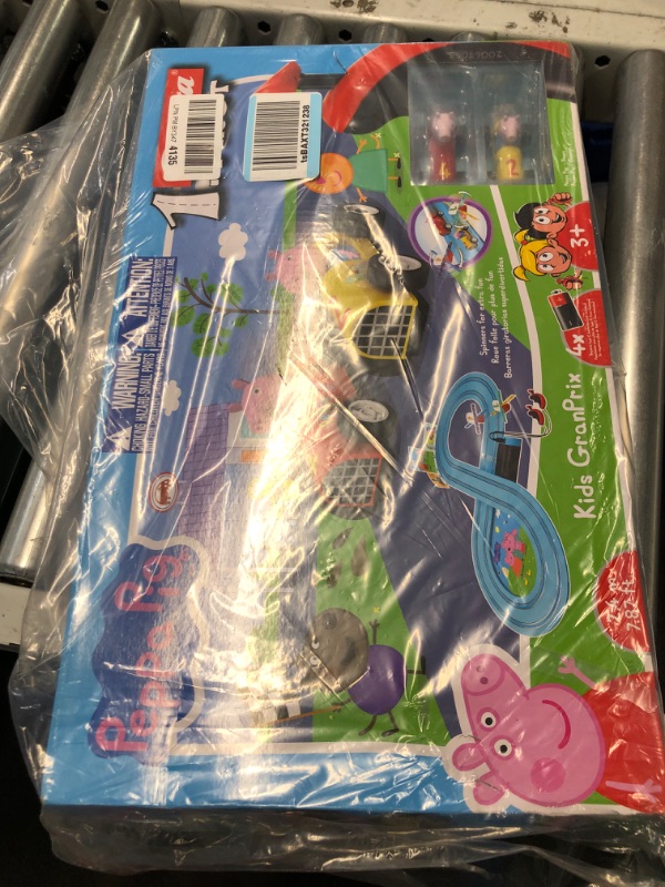 Photo 2 of Carrera First Peppa Pig - Kids GranPrix Slot Car Race Track with Spinners - Includes Peppa Pig and George Cars - Battery-Powered Beginner Racing Set for Kids Ages 3 Years and Up