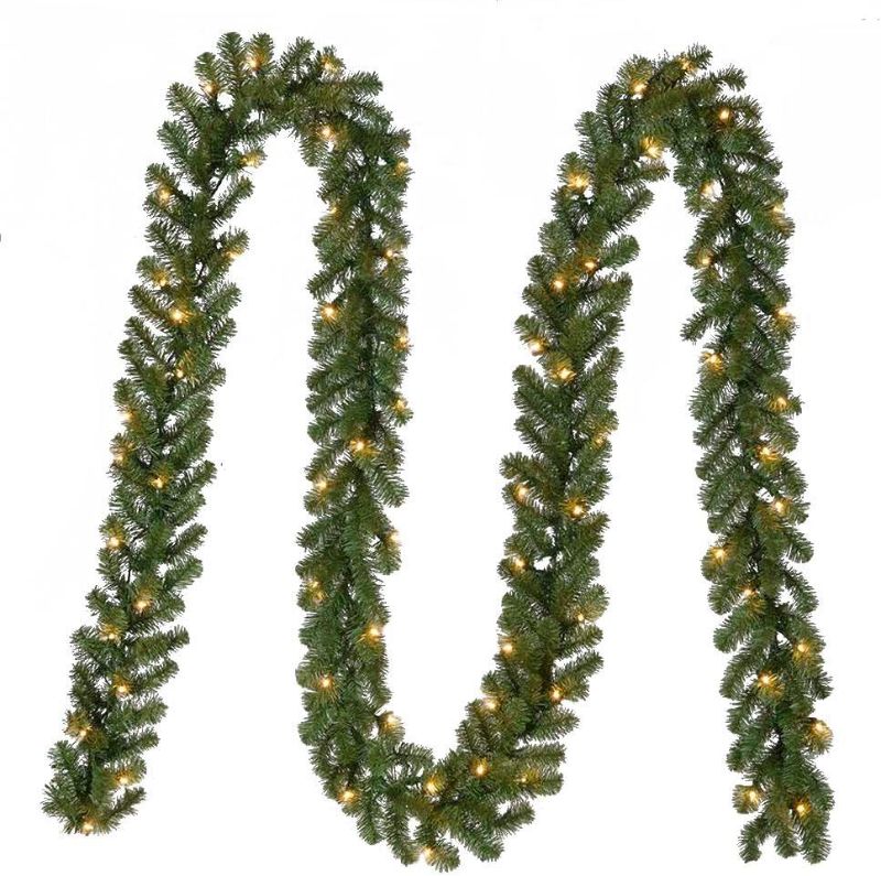 Photo 1 of Home Accents Holiday 18 ft. Pre-Lit Kingston Indoor/Outdoor Garland Decoration with 70 Sparkling Warm Clear Lights
