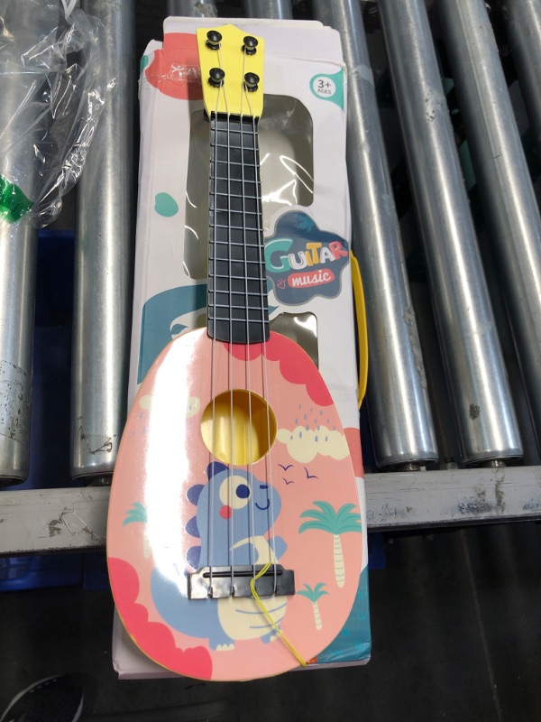 Photo 2 of **STOCK PHOTO FOR REFERENCE ONLY***
YOLOPARK 17" Kids Toy Guitar for Girls Boys, Mini Toddler Ukulele Guitar with 4 Strings Keep Tones Can Play for 3, 4, 5, 6, 7 Year Old Kids Musical Instruments Educational Toys for Beginner (Pink)