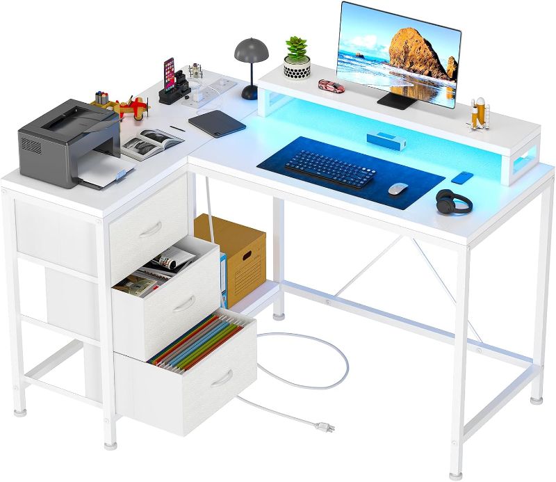 Photo 1 of **SIMILAR TO STOCK PHOTO*** L Shaped Desk with Power Outlets