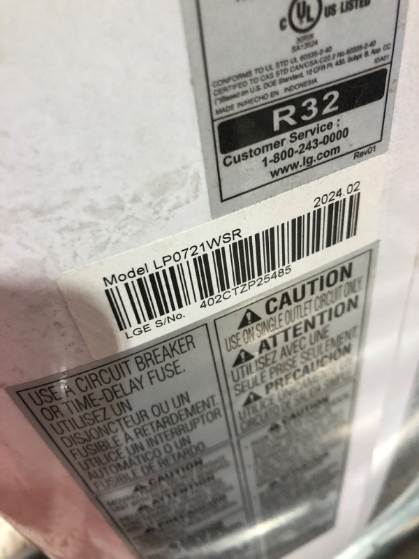 Photo 5 of **missing remote, damaged plug** 7,000 BTU (12,000 BTU ASHRAE) 115V Portable Air Conditioner Cools 300 Sq. Ft. with Dehumidifier in White
