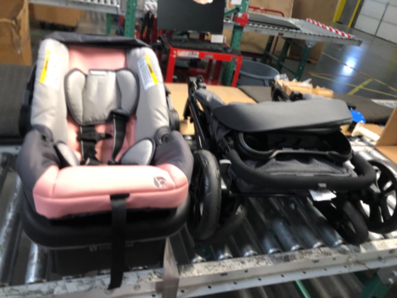 Photo 2 of ***USED - LIKELY MISSING PARTS - UNABLE TO VERIFY FUNCTIONALITY***
Baby Trend Passport Carriage Travel System, Dash Pink