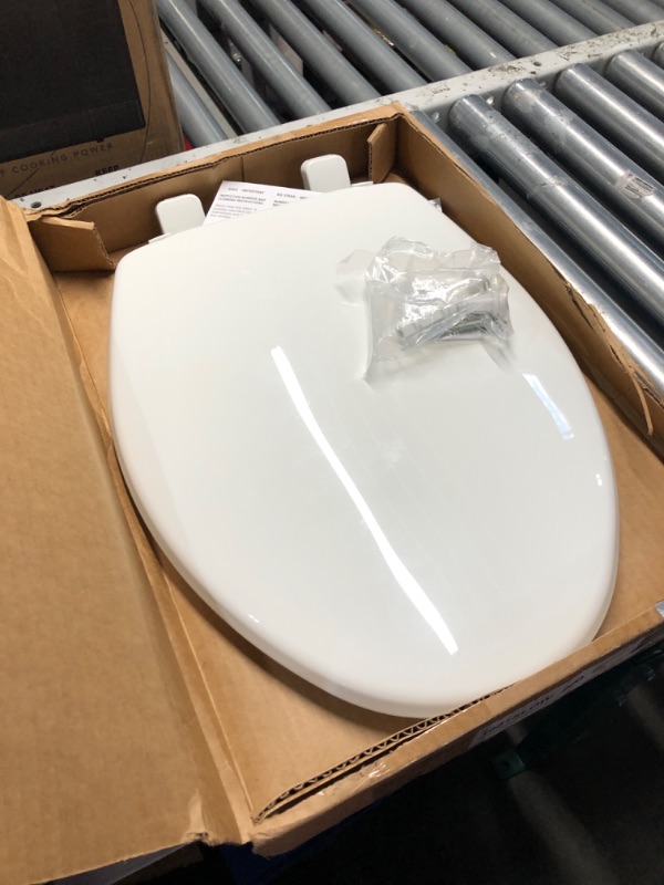 Photo 2 of **OPEN BOX - APPEARS UNUSED**
Bemis 1500EC 390 Toilet Seat with Easy Clean & Change Hinges, Elongated, Durable Enameled Wood, Cotton White