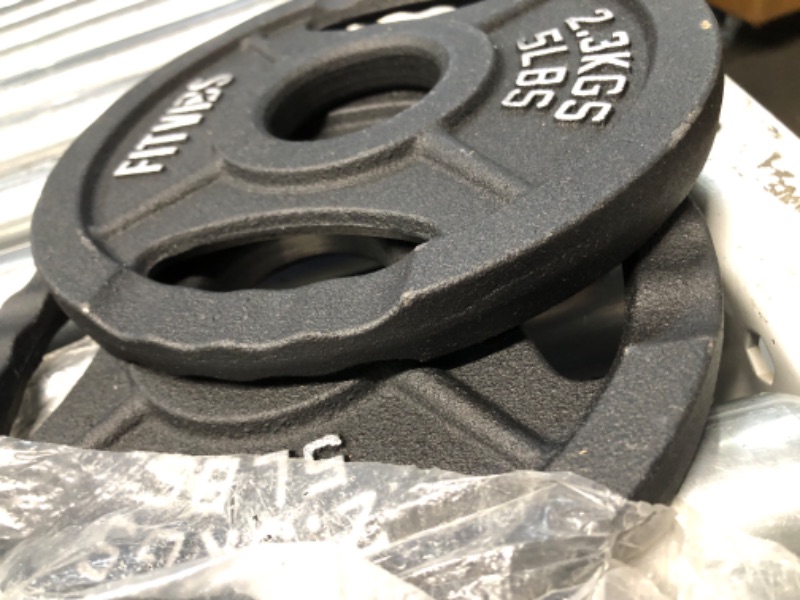 Photo 1 of Signature Fitness Olympic 2-Inch Cast Iron Plate Weight Plate for Strength Training and Weightlifting, Multiple Sizes 35LB Set Two Hole Style