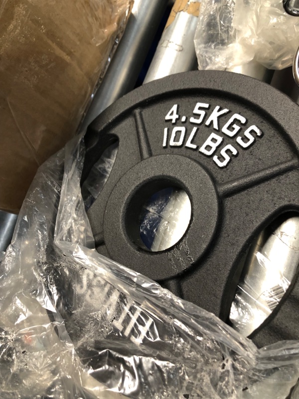 Photo 1 of Signature Fitness Olympic 2-Inch Cast Iron Plate Weight Plate for Strength Training and Weightlifting, Multiple Sizes 35LB Set Two Hole Style