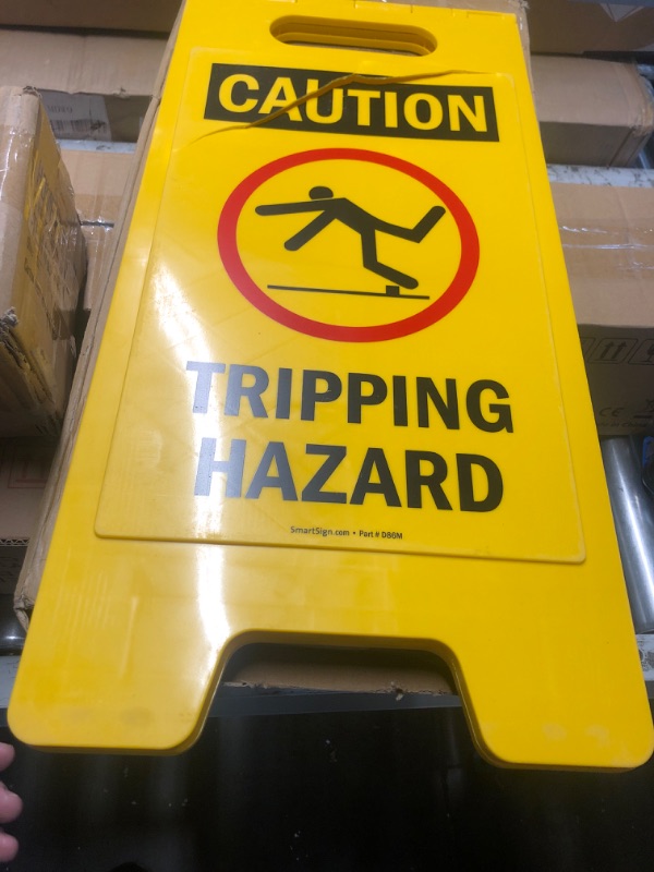 Photo 2 of (MINOR DAMAGE/ HAS A CRACK) SmartSign 25 x 12 inch “Caution - Slippery Floor” Two-Sided Folding Floor Sign with Symbol, Digitally Printed Polypropylene Plastic, Red, Black and Yellow Plastic Sign