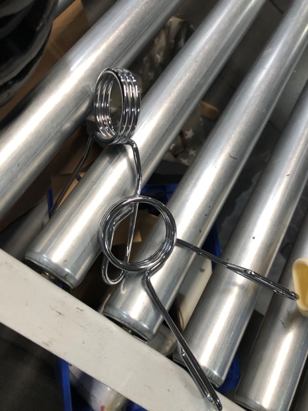 Photo 1 of Signature Fitness Olympic 2-Inch Cast Iron Plate Weight Plate for Strength Training and Weightlifting, Multiple Sizes 45LB Set Two Hole Style