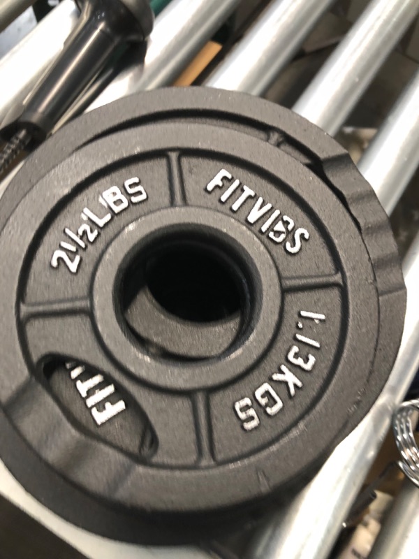 Photo 1 of Signature Fitness Olympic 2-Inch Cast Iron Plate Weight Plate for Strength Training and Weightlifting, Multiple Sizes 45LB Set Two Hole Style