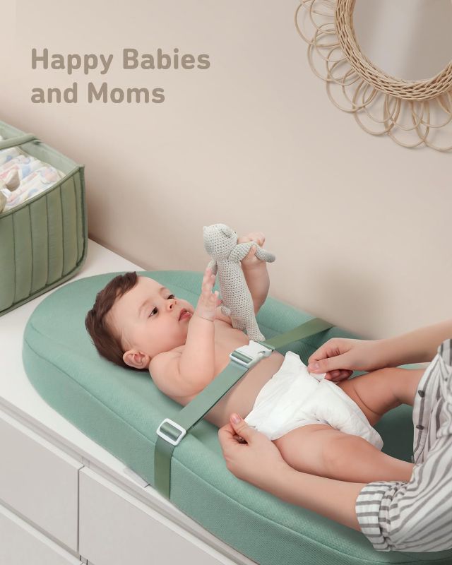 Photo 3 of (READ FULL POST) Contoured Changing Pad with Soft & Washable Cover, Waterproof Lining Foam Baby Changing Table Pads for Dresser Top, Secure with Security Strap and Two High Curved Sides, 32”×16”, Sage Green