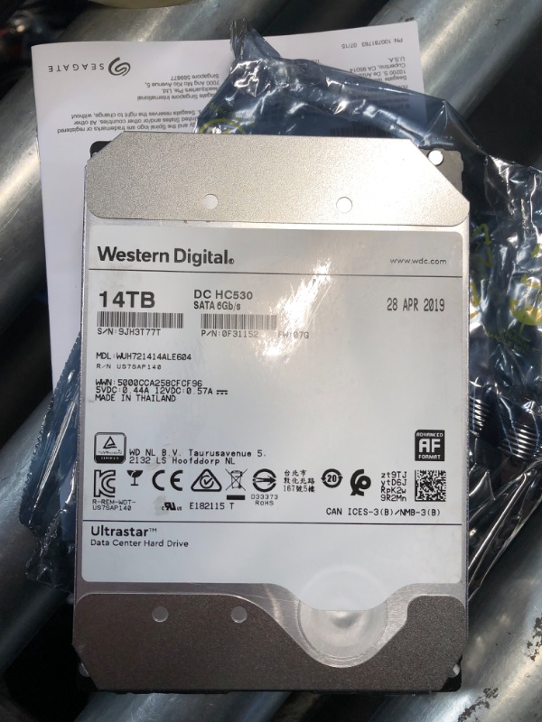 Photo 2 of (READ FULL POST) HGST WD Ultrastar DC HC530 14TB SATA 6Gb/s 3.5-Inch Data Center HDD - WUH721414ALE604 0F31152 (Renewed)