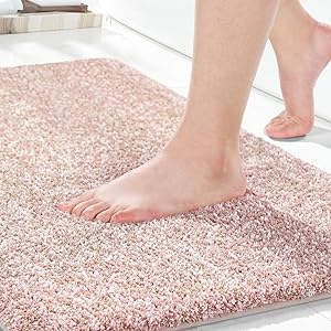 Photo 1 of Yimobra Bathroom Rugs Mat, Extra Soft Comfortable Bath Rugs, Non-Slip, Water Absorbent and Thick Bathroom Floor Mat, Machine Washine, Shaggy Rugs for Shower Bathtubs, 47"x24", PINK 
