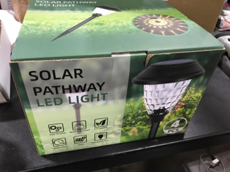 Photo 2 of Solar Lights Outdoor Waterproof,Solar Pathway Lights,Supper Bright UP to 12 Hrs Stainless Steel Solar Garden Lights,Landscape Lighting for Yard Patio Walkway Driveway Pathway (4Pack/Warm Light)
