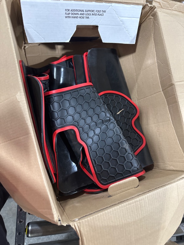 Photo 1 of black and red car mats, unknown compatibility 