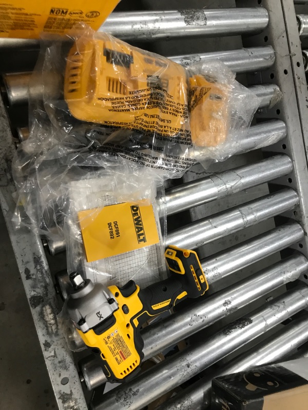 Photo 2 of DEWALT 20V MAX* Impact Wrench, Automotive Kit, 1/2-Inch Mid-Range Wrench and Grease Gun, 2-Tool 