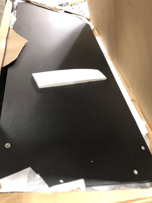 Photo 1 of ODK 55 Inch Small L Shaped Gaming Computer Desk with Power Outlets,Corner Desk with Reversible Storage Shelves & PC Stand for Small Space, Modern Simple Home Office Table, Carbon Fiber Surface, Black Carbon Fiber Surface, Black 55 inch