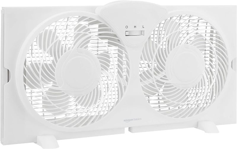 Photo 1 of Amazon Basics Window Fan with Manual Controls, Twin 9 Inch Blades, White
