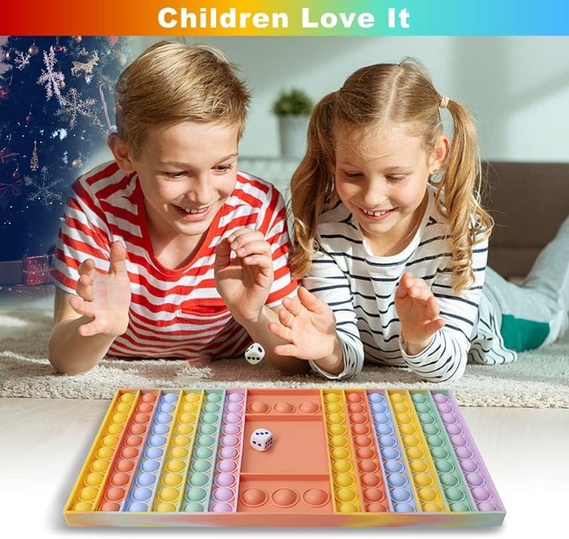 Photo 1 of Big Pop It Fidget Game Chess Board with Dice, Portable Poppit Macaron Push Bubble Fidget Sensory Toy, Popit Fidget Trading Games Rubber Popper Game for Kids and Adults, Stress Relief Chessboard
