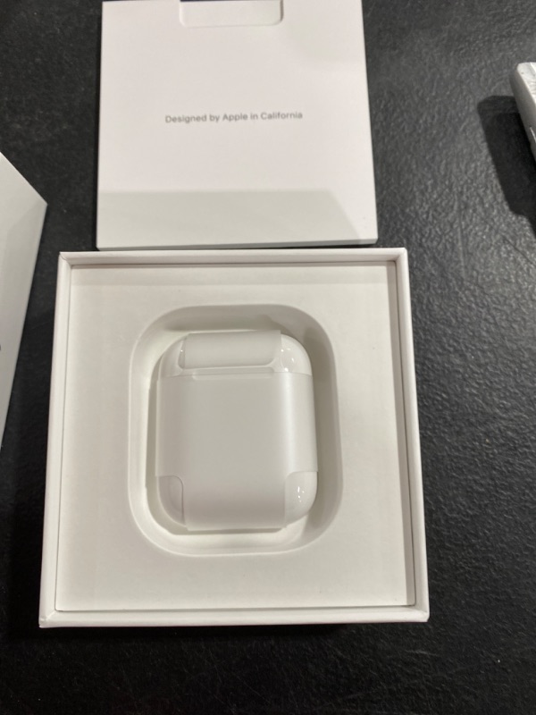 Photo 4 of Apple AirPods with Charging Case (Latest Model)