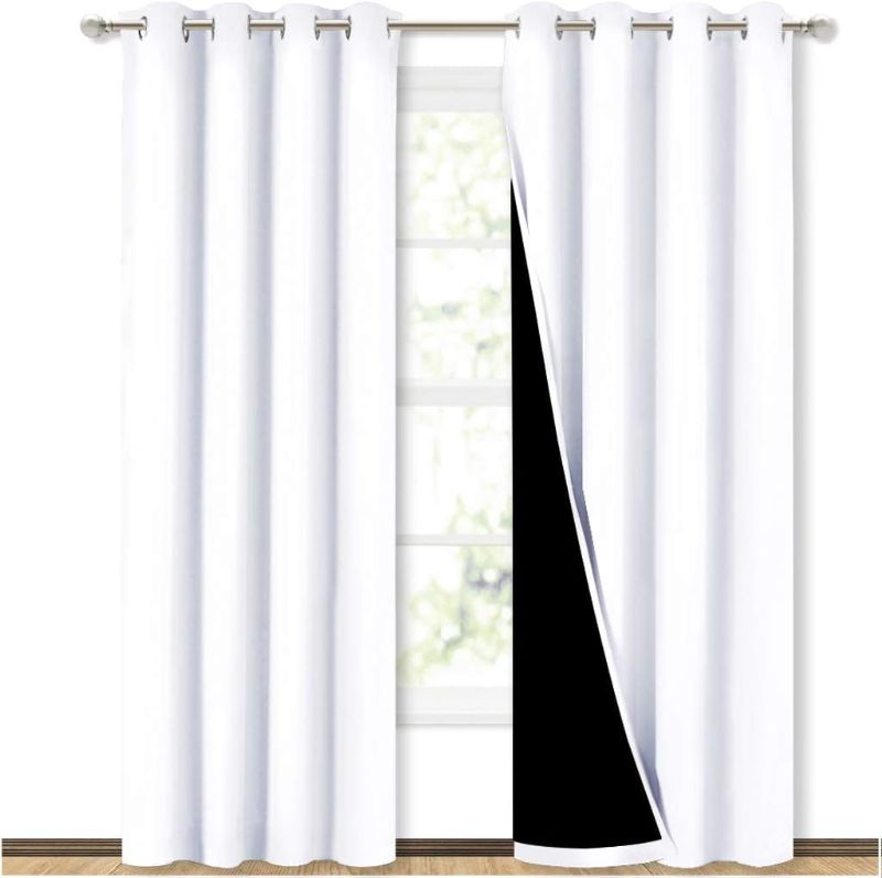 Photo 1 of NICETOWN 100% Blackout Curtain Set, Thermal Insulated & Energy Efficiency Window Draperies for Guest Room, Full Shading Panels for Shift Worker and Light Sleepers, Navy, 52W x 84L, 2 PCs
