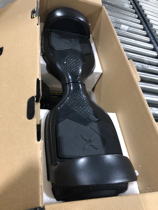 Photo 2 of Hover-1 Helix Electric Hoverboard | 7MPH Top Speed, 4 Mile Range, 6HR Full-Charge, Built-in Bluetooth Speaker, Rider Modes: Beginner to Expert Hoverboard Black