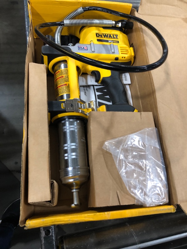 Photo 2 of DEWALT 20V MAX Grease Gun, Cordless, 42” Long Hose, 10,000 PSI, Variable Speed Triggers, Bare Tool Only (DCGG571B)or Kids, Silver 11 Functions + (2) 24 oz. Pints