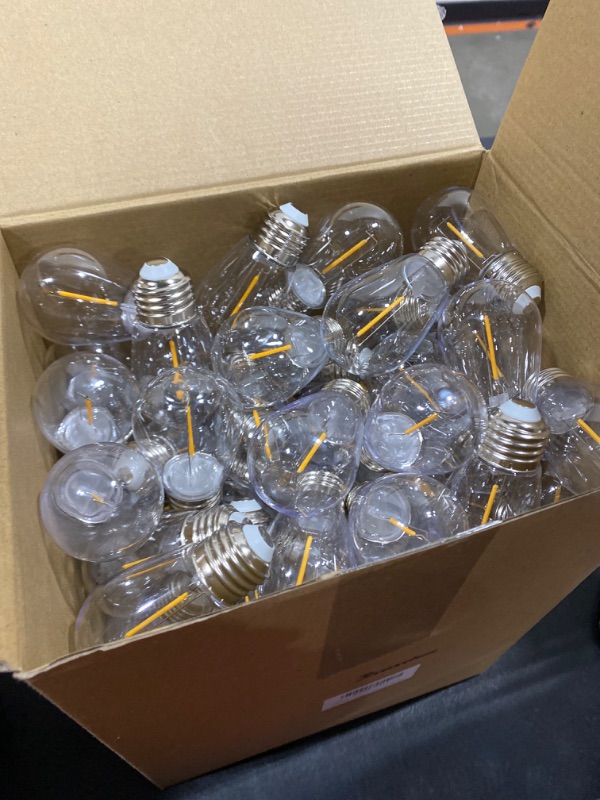 Photo 3 of S14 LED Replacement Light Bulbs Shatterproof Waterproof String Light Replacement Bulb 1w Outdoor LED Bulb Vintage Patio Light Bulb E26 Base 110v Plastic LED Filament Clear Bulb (Warm White, 100 Pcs) 100 Warm White