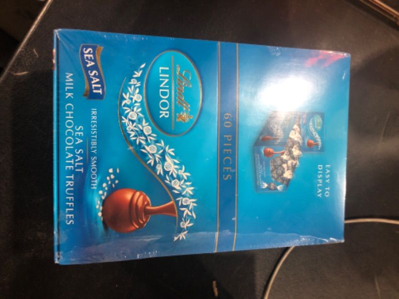 Photo 2 of Lindt LINDOR Sea Salt Milk Chocolate Truffles, Milk Chocolate Candy with Smooth, Melting Truffle Center, Great for gift giving, 25.4 oz, 60 Count Sea Salt 1.6 Pound (Pack of 1) exp 01/31/2024