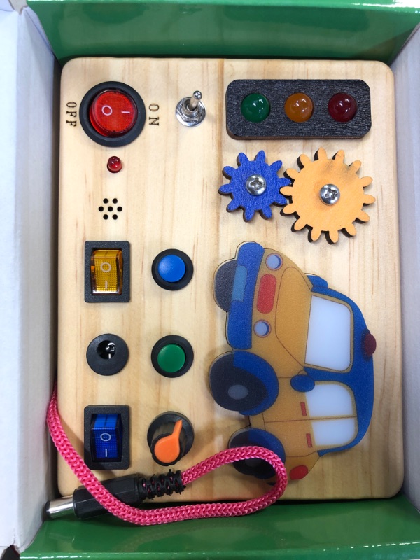 Photo 2 of Auney Montessori Busy Board with Traffic Led Lights,Wooden Sensory Toys for Toddlers 1,Baby Travel Toys with 7 Different Led Lights Sound Button,Educational Toys for 1+ Year Old Boy Car Style Gift