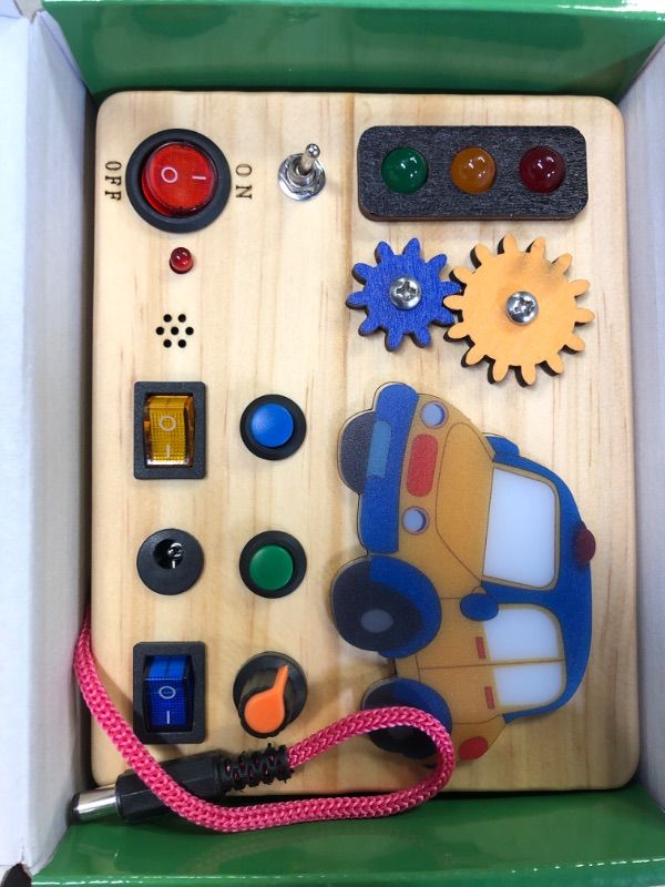 Photo 3 of Auney Montessori Busy Board with Traffic Led Lights,Wooden Sensory Toys for Toddlers 1,Baby Travel Toys with 7 Different Led Lights Sound Button,Educational Toys for 1+ Year Old Boy Car Style Gift