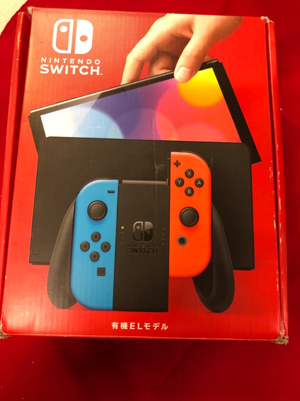 Photo 2 of Nintendo Switch | OLED Model | w/ Neon Red & Neon Blue Joy-Con