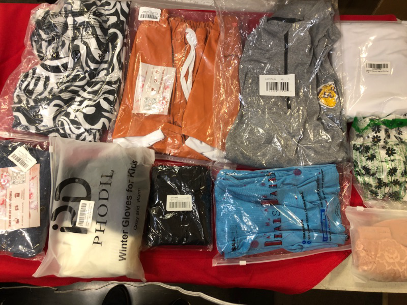 Photo 1 of BAG LOT OF MISC CLOTHES (SIZES VARIES)