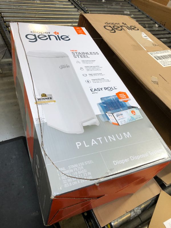 Photo 1 of Diaper Genie Platinum Pail (Lilly White) is Made of Durable Stainless Steel and Includes 1 Easy Roll Refill with 18 Bags That can Last up to 5 Months.