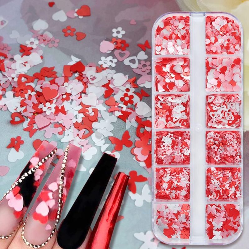 Photo 1 of 12 Grids 3D Heart Nail Art Glitter Sequins for Valentine's Day, Holographic Heart Love Butterfly Flower Shaped Shiny Confetti Flake Decals for Face Body Eyes Nail Art Decoration DIY Craft
