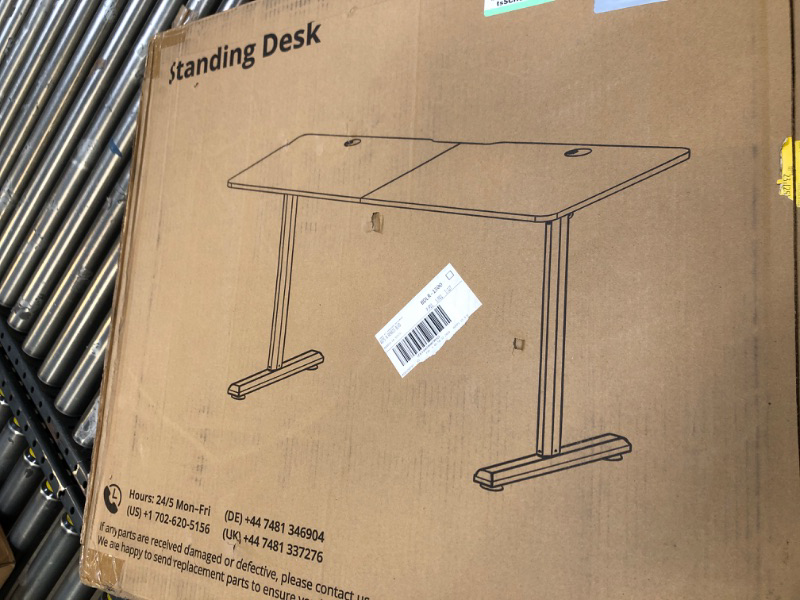 Photo 1 of STANDING DESK ---FACTORY SEALED 