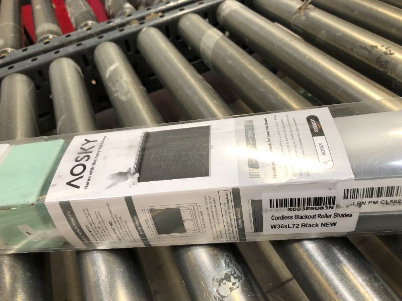 Photo 1 of AOSKY Cordless Roller Shades Blackout Blinds for Windows Room Darkening Rolled Up Shades with Spring System, UV Protection Window Shades Door Blinds for Home and Office (36" W x 72" H, Black) 36x72 Black