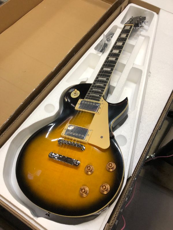 Photo 2 of Leo Jaymz 24.75" Single Cut Curved Top Sunburst Electric Guitar - Classic single cut top curved body - Mahogany Body and Neck?Ebony Fingerboard (SunBurst)