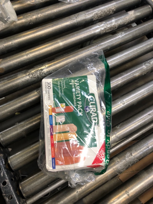 Photo 1 of Curad Assorted Bandages Variety Pack 300 Pieces, Including Antibacterial, Heavy Duty, Fabric, and Waterproof Bandages