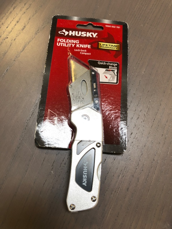 Photo 2 of Husky Folding Sure-Grip Lock Back Utility Knife w/ Single Disposable Blade Included (Colors May Vary)