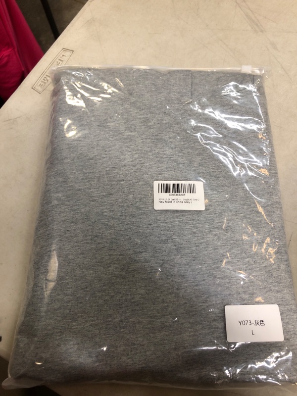 Photo 1 of grey sweat shirt - size large - 