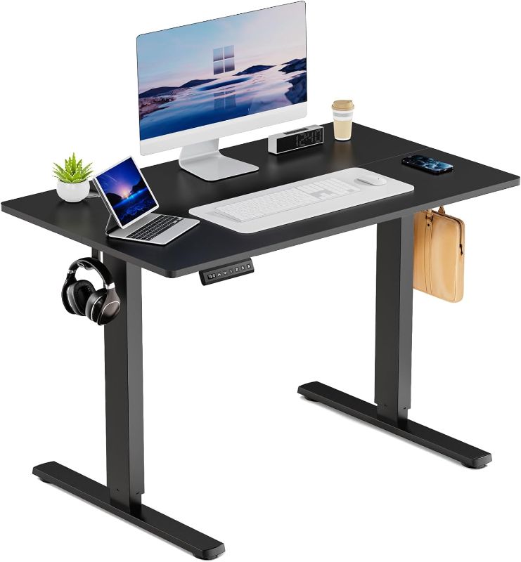 Photo 1 of DUMOS 40 Inch Electric Standing Office Desk Height Adjustable Sit Stand up PC Workstation Wood Computer Work Table for Home Bedroom Gaming Room Small Spaces
