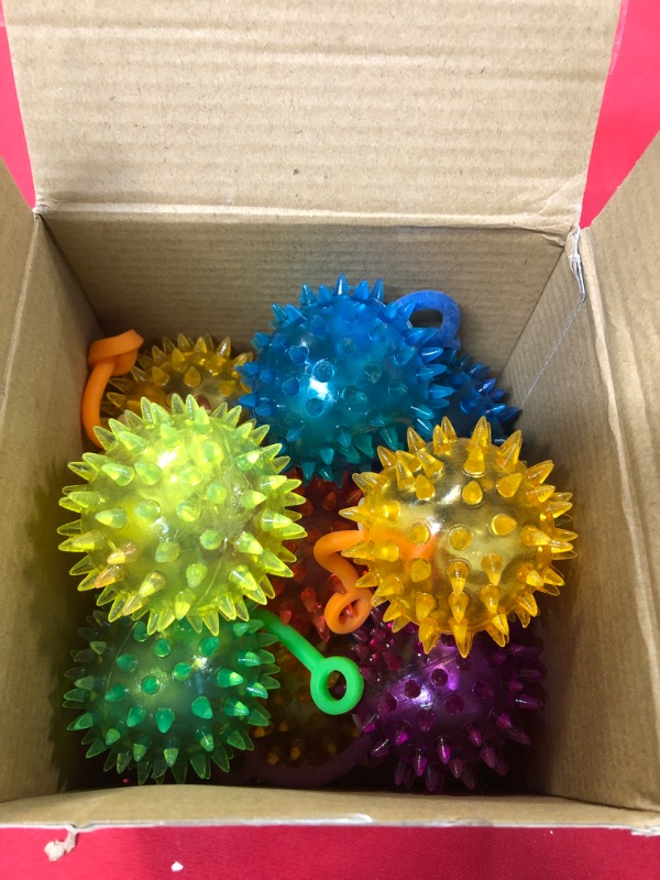 Photo 2 of 18 Pieces Light up LED Ball Spiky Bouncy Ball Flashing Squeaky Ball Multicolor Puffer Balls Stress Relief Balls Rubber Sensory Toy Carnival Prizes Bulk Party Favors for Kids, Teens, Adults