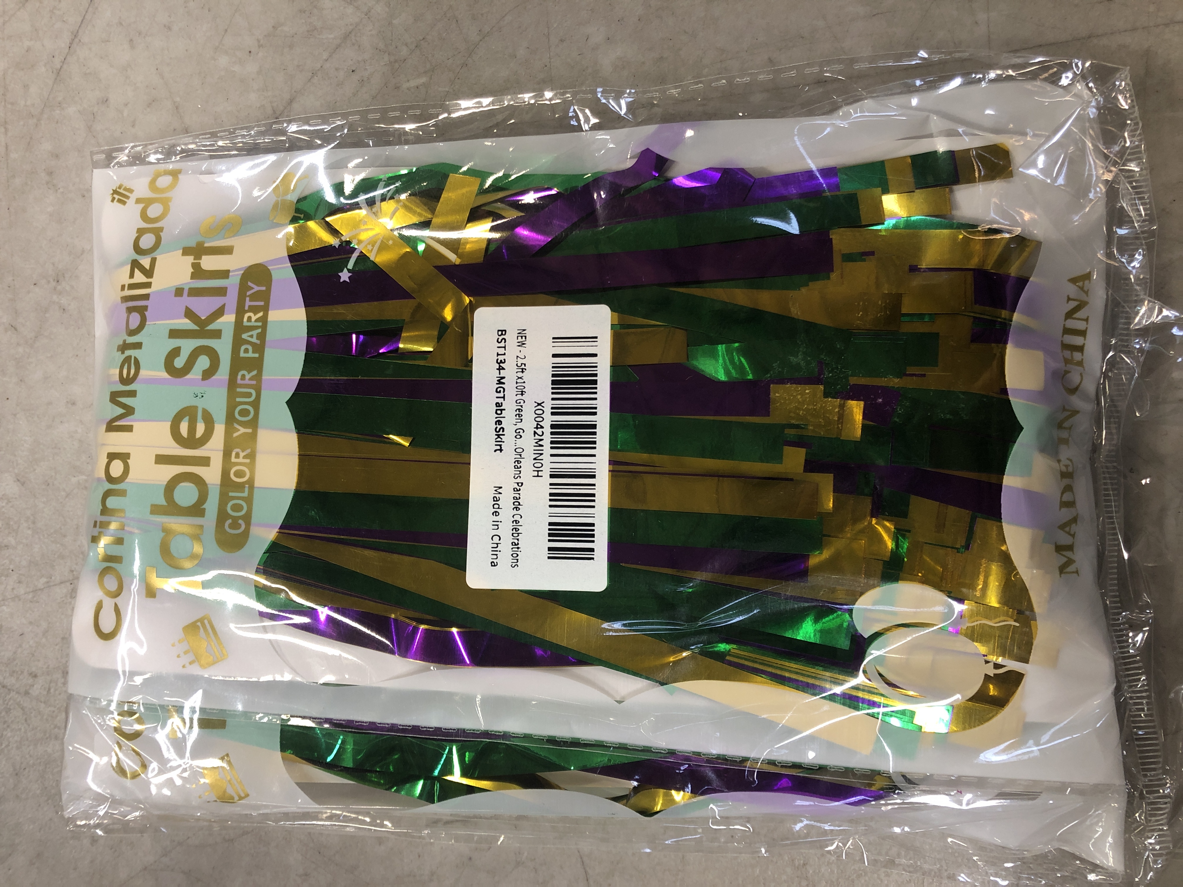 Photo 1 of 2.5 ft x 10 ft Green, Gold, and Purple Metallic Foil Fringe Table Skirt, Mardi Gras Party Tinsel Table Skirts Cover, Perfect Carnival Decorations for Fat Tuesday, New Orleans Parade Celebrations 2PACK