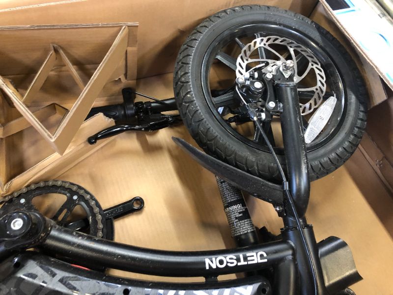 Photo 3 of **missing charger and plastic cover is loose, its dirty and has some minor scratches, lights non-functional** Jetson Bolt Pro Folding Electric Bike - Black