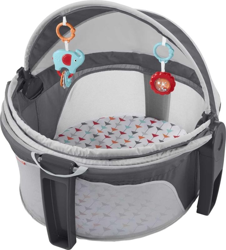 Photo 1 of Fisher-Price Baby Portable Bassinet and Play Space On-the-Go Baby Dome with Developmental Toys and Canopy, Arrows Away