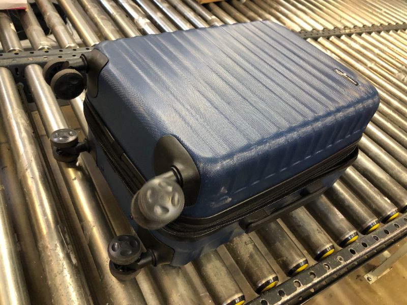 Photo 1 of amazon basics blue luggage 