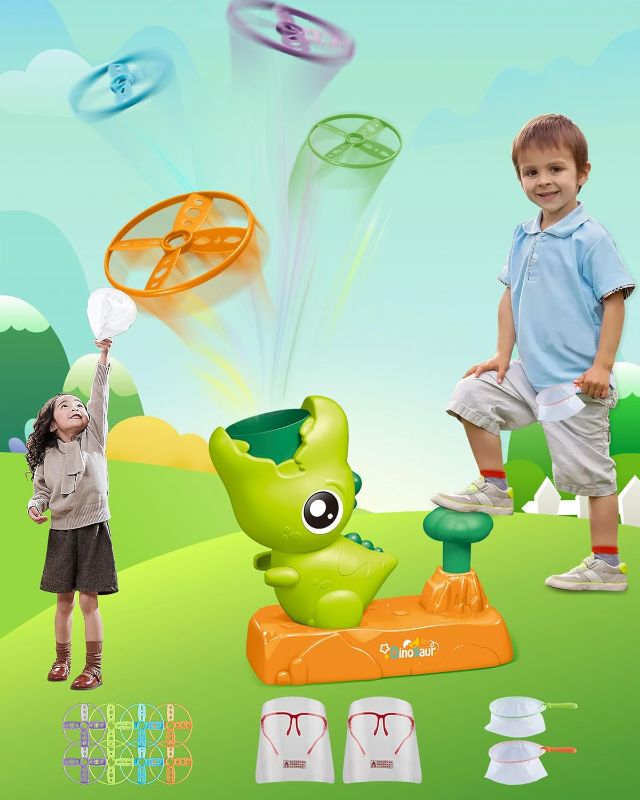 Photo 1 of XINHOME Outdoor Flying Disc Launcher Toys for Kids 3 4 5 6 7 8 Year Old Boys Girls Dinosaur Stomp Rocket for Toddlers Backyard Toys
