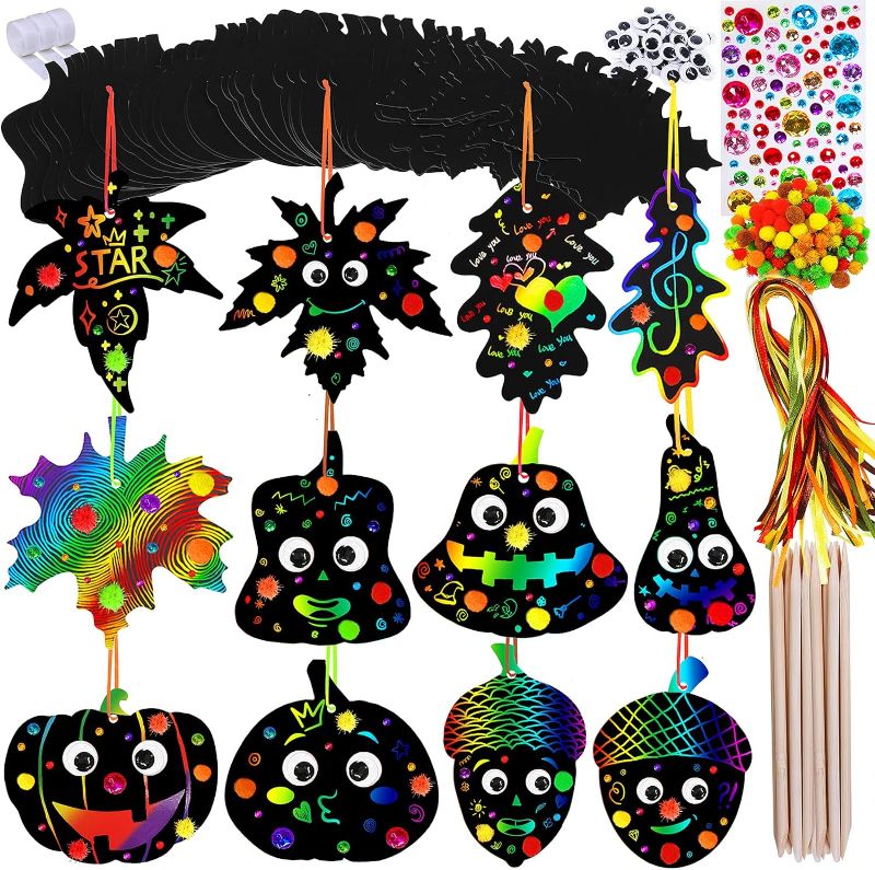 Photo 1 of 
Winlyn 72 Sets Magic Color Art Rainbow Scratch Paper Fall Ornaments Decorations Fall Craft Kits Scratch Art Autumn Maple Leaves Pumkins Acorns for Kids...