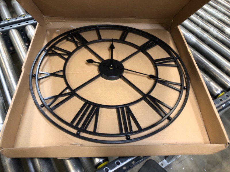 Photo 1 of Metal Wall Clocks 23.5 Inch Large Roman Numeral Wall Clock Silent Non Ticking Battery Operated Modern Round Wall Clock for Living Room Kitchen Bedroom Office Decor Black