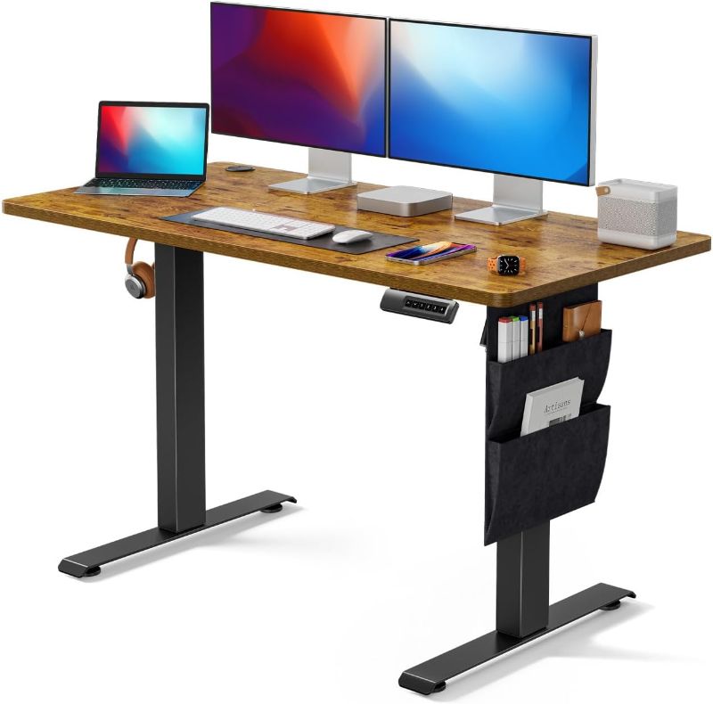 Photo 1 of Marsail Standing Desk Adjustable Height,?48x24 Inch Electric Standing Desk, Stand up Desk with Storage Bag,Headphone Hook for Computer Workstations Desk Memory Preset
